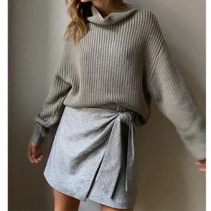 Grey wool cashmere mini wrap skirt by Aritzia